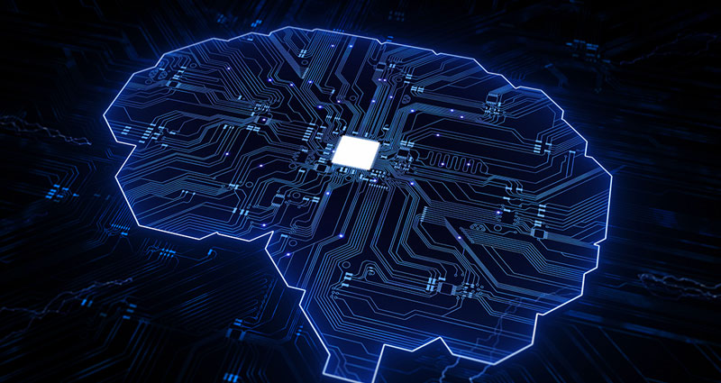 Circuitry in the shape of a brain with a processor at the center.